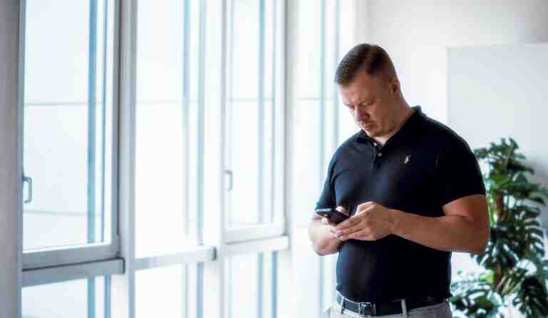 a person looking at the phone